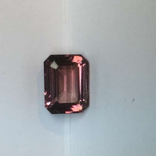 TOURMALINE , 2,44 CT BROWNISH RED EMERALD CUT