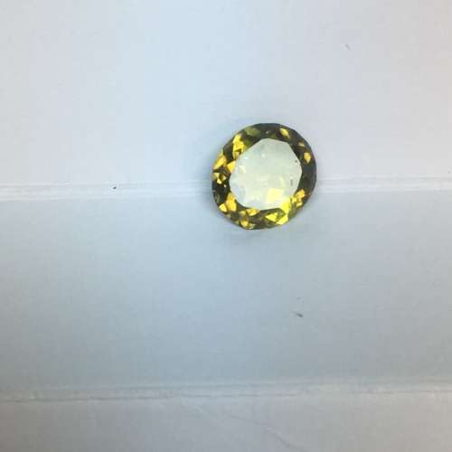 TOURMALINE ,1,54 CT OVAL YELLOWISH GREEN