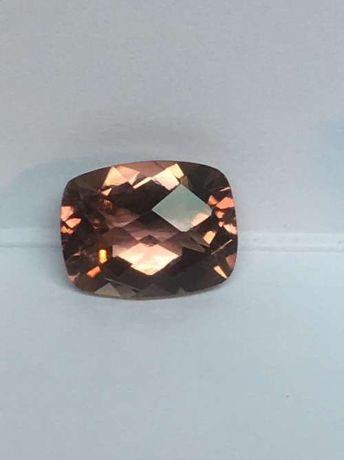 EYE CLEAN BROWNISH ORANGE CUSHION SHAPE TOURMALINE