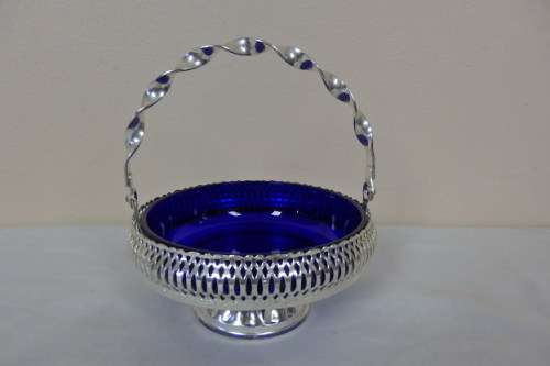 A GORGEOUS ENGLISH MADE SILVER PLATED FOOTED CONDIMENT STAND WITH A "COBALT" BLUE GLASS BOWLS