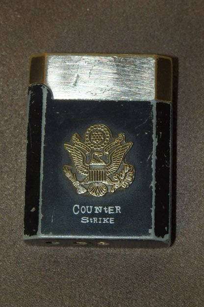 AN AWESOME "COUNTER STRIKE" BRANDED (BROMINE GAS) CIGARETTE/ CIGAR LIGHTER