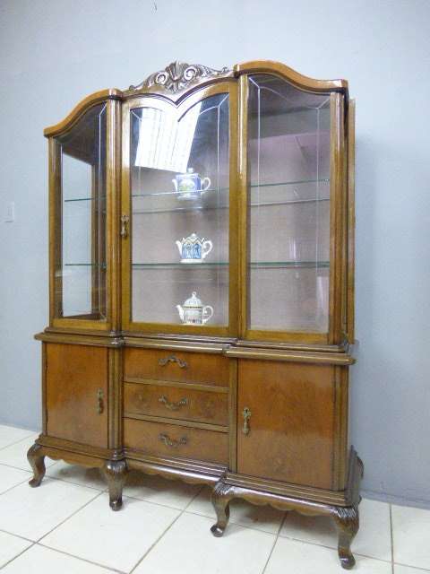 AN EXQUISITE GABLED SHOWCASE CABINET w 2 SHELVES, 3 DRAWERS & 2 CUPBOARDS. ABSOLUTELY STUNNING!!!