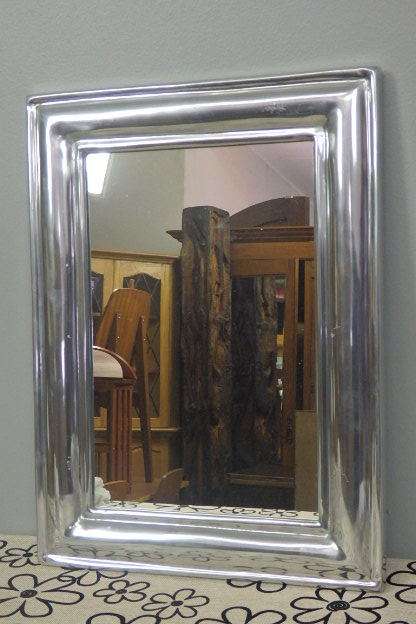 AN INCREDIBLE STYLISH MODERN BRUSHED ALUMINIUM WALL MIRROR WITH A STYLISED FRAME