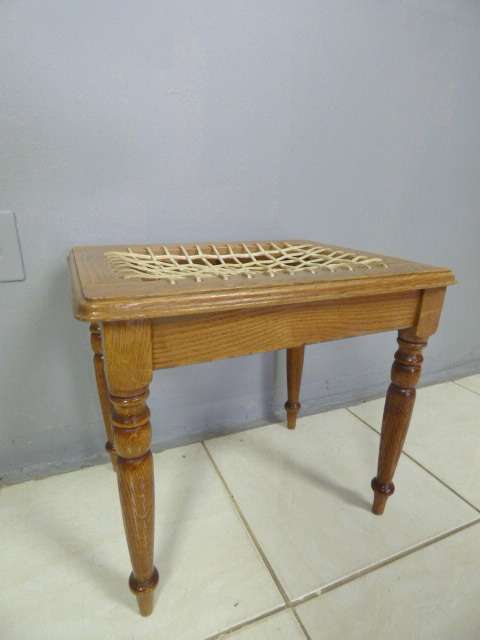 AN AWESOME OAK RIEMPIE STOOL WITH GORGEOUS TURNED ARROW LEGS, PERFECT IN THE LAPA OR ON A PATIO!