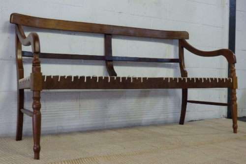 A SPECTACULAR ANTIQUE CAPE STINKWOOD RIEMPIE BENCH (RUSBANK) IN FANTASTIC CONDITION