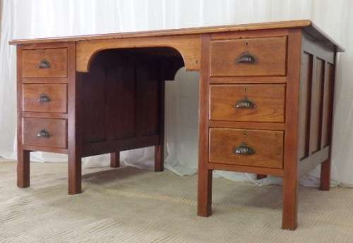 A FANTASTIC ANTIQUE SOLID TEAK SIX-DRAWER OFFICE DESK WITH ART NOUVEAU STYLE HANDLES