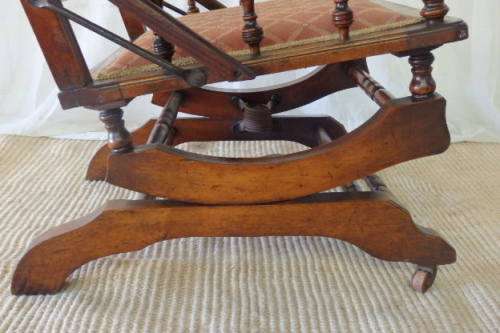 A MAGNIFICENT ANTIQUE VICTORIAN TURNED BEECH WOOD "AMERICAN" MECHANICAL ROCKING CHAIR