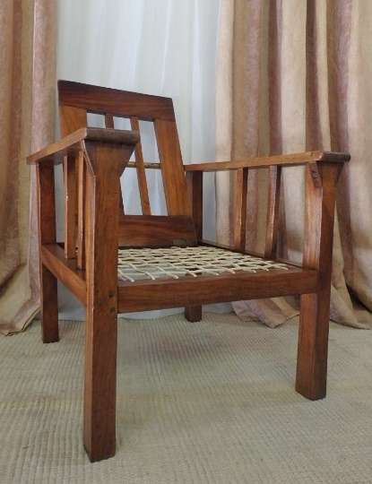A WONDERFUL VINTAGE (LARGE) SOLID TEAK RIEMPIE CHAIR WITH WITH A FOLD-DOWN BACKTREST