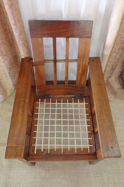 A WONDERFUL VINTAGE (LARGE) SOLID TEAK RIEMPIE CHAIR WITH WITH A FOLD-DOWN BACKTREST