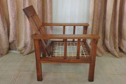 A WONDERFUL VINTAGE (LARGE) SOLID TEAK RIEMPIE CHAIR WITH WITH A FOLD-DOWN BACKTREST