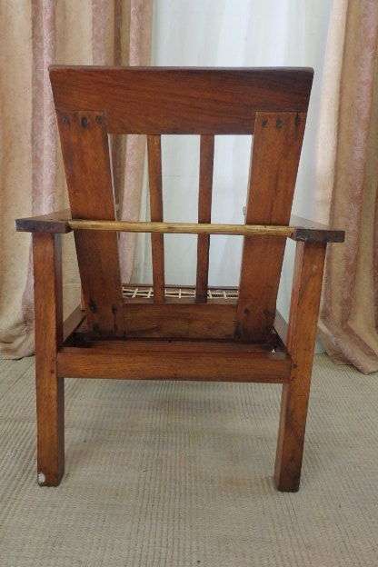 A WONDERFUL VINTAGE (LARGE) SOLID TEAK RIEMPIE CHAIR WITH WITH A FOLD-DOWN BACKTREST