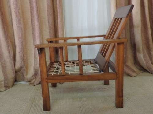 A WONDERFUL VINTAGE (LARGE) SOLID TEAK RIEMPIE CHAIR WITH WITH A FOLD-DOWN BACKTREST