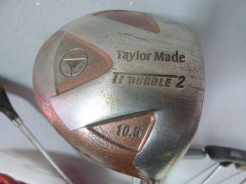 A FANTASTIC RED TONEY PENNA GOLF BAG WITH A TONEY PENNA GOLD 1, TI BUBBLE 2 & 4 PUTTERS.