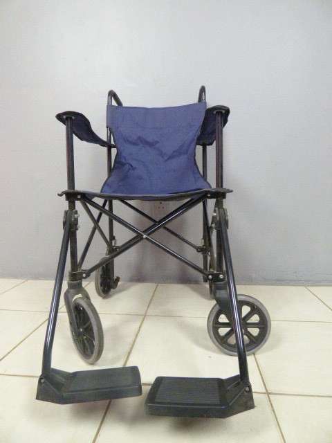 A SUPER LIGHT FOLDING TRANSPORT CHAIR, TRAVEL WHEELCHAIR. GREAT FOR QUICK TRIPS!!