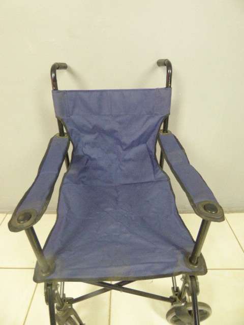 A SUPER LIGHT FOLDING TRANSPORT CHAIR, TRAVEL WHEELCHAIR. GREAT FOR QUICK TRIPS!!