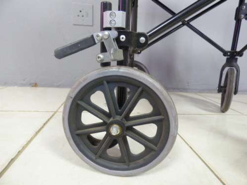 A SUPER LIGHT FOLDING TRANSPORT CHAIR, TRAVEL WHEELCHAIR. GREAT FOR QUICK TRIPS!!