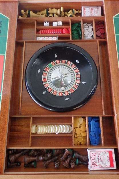 A SPECTACULAR RARE MID-CENTURY ITALIAN MADE MARQUETRY GAMES TABLE WITH VARIOUS INLAY BOARD GAMES