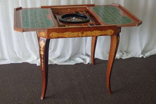 A SPECTACULAR RARE MID-CENTURY ITALIAN MADE MARQUETRY GAMES TABLE WITH VARIOUS INLAY BOARD GAMES