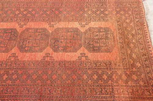 AN INCREDIBLE ANTIQUE PERSIAN CARPET (2.1m x 1.3m) IN EARTHY TONES ENCOMPASSED IN CLARET RED COLOURS