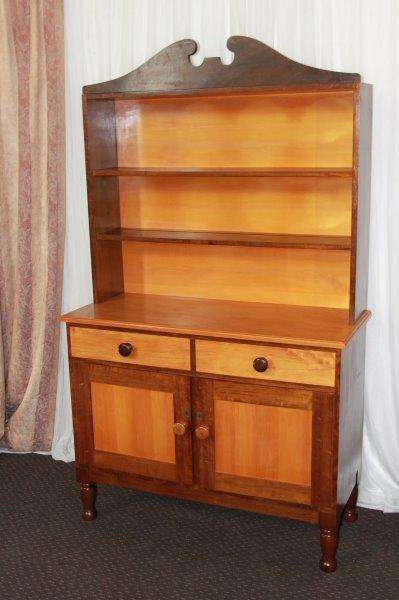 AN EXQUISITE AND VERY WELL MADE YELLOW WOOD AND IMBUIA BUFFET SERVER WITH AMPLE SPACE