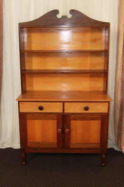 AN EXQUISITE AND VERY WELL MADE YELLOW WOOD AND IMBUIA BUFFET SERVER WITH AMPLE SPACE