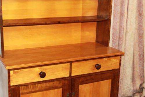 AN EXQUISITE AND VERY WELL MADE YELLOW WOOD AND IMBUIA BUFFET SERVER WITH AMPLE SPACE