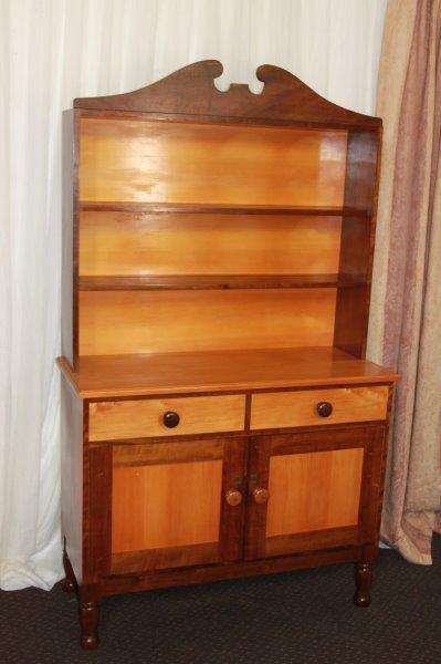 AN EXQUISITE AND VERY WELL MADE YELLOW WOOD AND IMBUIA BUFFET SERVER WITH AMPLE SPACE