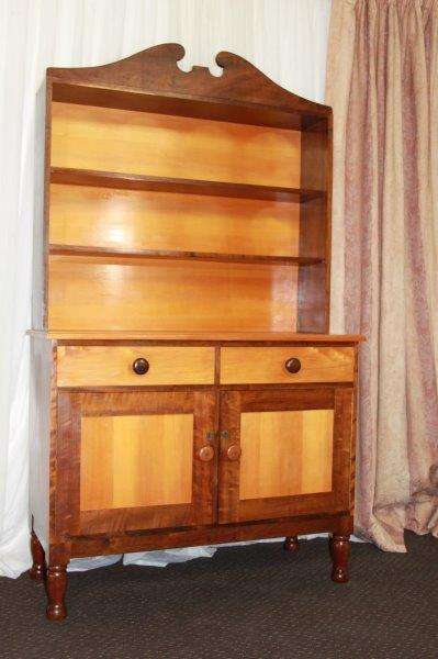 AN EXQUISITE AND VERY WELL MADE YELLOW WOOD AND IMBUIA BUFFET SERVER WITH AMPLE SPACE
