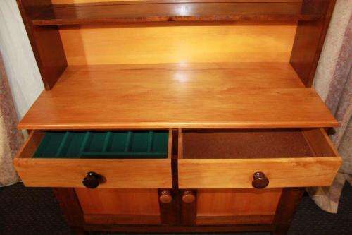 AN EXQUISITE AND VERY WELL MADE YELLOW WOOD AND IMBUIA BUFFET SERVER WITH AMPLE SPACE