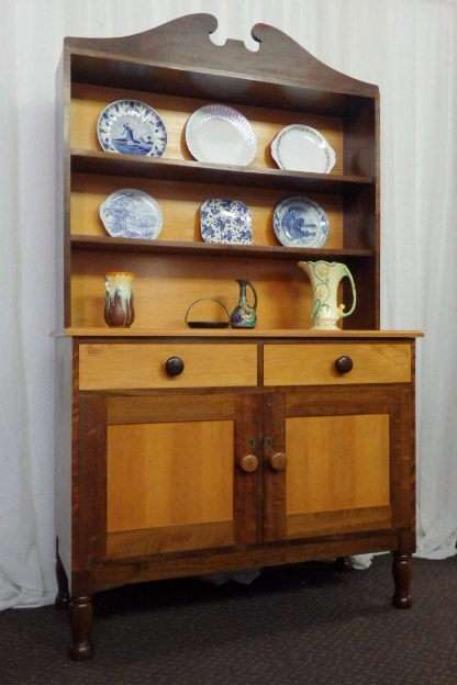AN EXQUISITE AND VERY WELL MADE YELLOW WOOD AND IMBUIA BUFFET SERVER WITH AMPLE SPACE