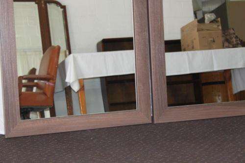 TWO FANTASTIC MODERN STYLED (LARGE) FRAMED WALL MIRRORS WITH HANGING BRACKETS ON THE BACK bid/mirror