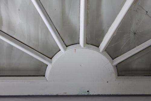 A RARE AND MAGNIFICENT ANTIQUE BEVELED GLASS "PEACOCK" DOUBLE DOOR ARCH TRANSOM WINDOW
