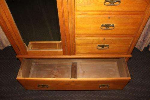 A BEAUTIFUL ANTIQUE SOLID YELLOW WOOD DOUBLE DOOR WARDROBE WITH A LARGE LINEN STORAGE DRAWER