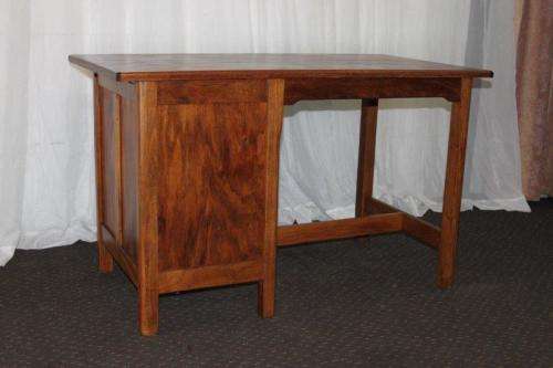 A STUNNING ANTIQUE SOLID TEAK THREE-DRAWER COMPACT OFFICE DESK WITH A PULL-OUT WORK SURFACE