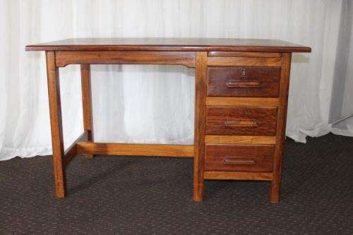 A STUNNING ANTIQUE SOLID TEAK THREE-DRAWER COMPACT OFFICE DESK WITH A PULL-OUT WORK SURFACE