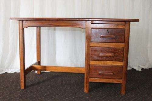 A STUNNING ANTIQUE SOLID TEAK THREE-DRAWER COMPACT OFFICE DESK WITH A PULL-OUT WORK SURFACE