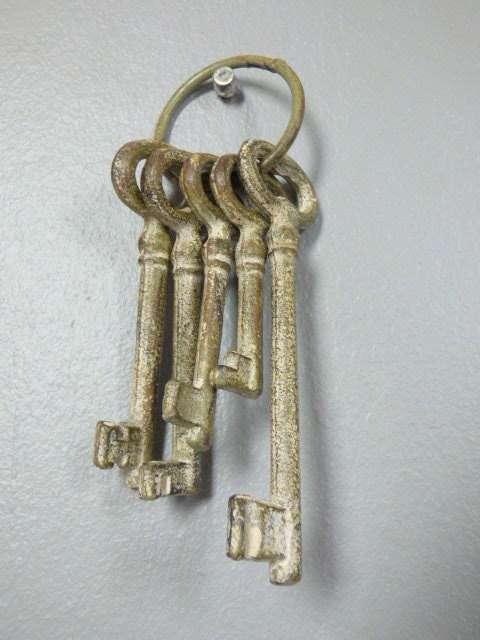 A FANTASTIC SET OF KEYS WITH LOADS OF OLD WORLD CHARM, BEAUTIFUL TO HANG ON THE PORCH/PATIO!!