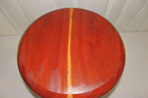 An awesome and solidly made Solid Teak four-legged stool in excellent condition