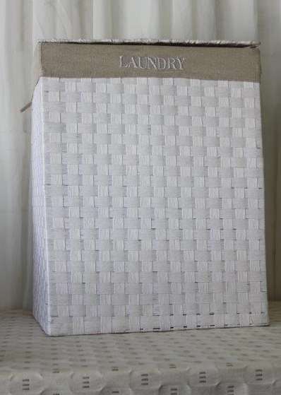 A FABULOUS WHITE LAUNDRY BASKET WITH A NATURAL LINEN (REMOVABLE) EMBROIDERED LINEN BAG