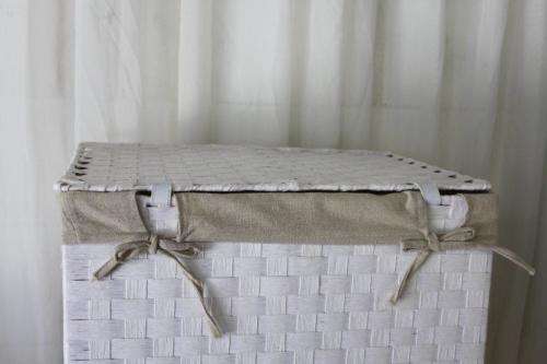 A FABULOUS WHITE LAUNDRY BASKET WITH A NATURAL LINEN (REMOVABLE) EMBROIDERED LINEN BAG