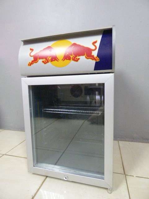AN AWESOME MODERN RED BULL MINI FRIDGE COOLER. STUNNING IN YOUR PUB/LAPA!!!