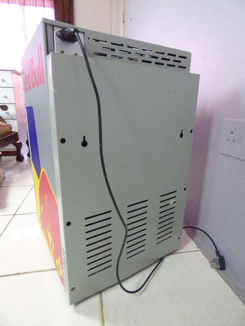 AN AWESOME MODERN RED BULL MINI FRIDGE COOLER. STUNNING IN YOUR PUB/LAPA!!!