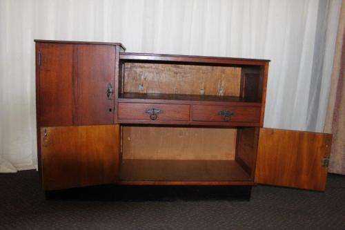 AN AMAZING ANTIQUE ART DECO SIDE SERVER WITH LOADS OF CUPBOARD SPACE AND A TIERED SERVING SURFACE