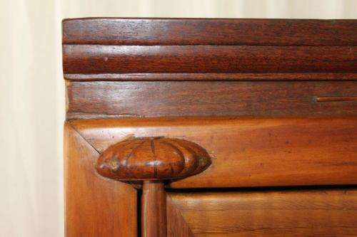 AN INCREDIBLE ANTIQUE DOUBLE DOOR CHINESE CABINET WITH TRADITIONAL HANDLES AND HINGES AND A DRAWER