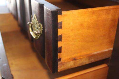 A SUPERB ANTIQUE SOLID STINKWOOD BALL AND CLAW FLIP-TOP WRITING DESK WITH TWO LARGE DRAWERS