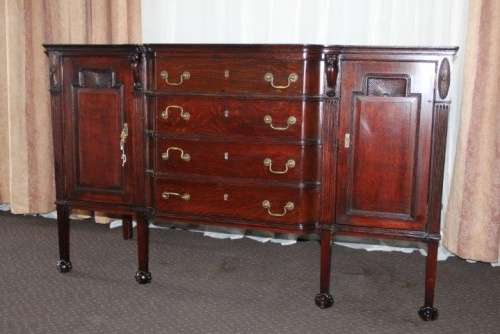 A MAGNIFICENT SOLID COGNAC OAK 4-DRAWER SIDE SERVER WITH LION HEAD CARVINGS & GEORGIAN CARVED LEGS