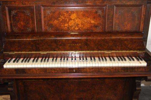 A MAGNIFICENT ANTIQUE WERNAM LONDON WALNUT AND WALNUT BURR UPRIGHT PIANO WITH MARQUETRY DETAILING