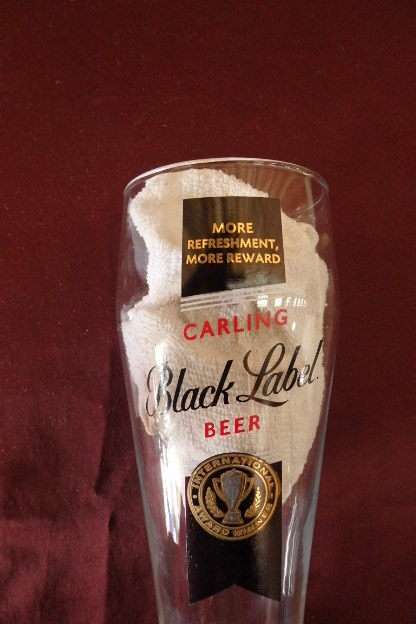 A FANTASTIC COLLECTION OF SIX 500ml CARLING BLACK LABEL BEER BRANDED BEER GLASSES bid/glass