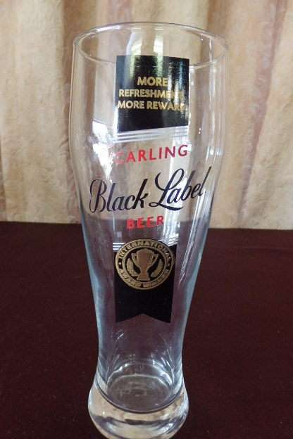 A FANTASTIC COLLECTION OF SIX 500ml CARLING BLACK LABEL BEER BRANDED BEER GLASSES bid/glass
