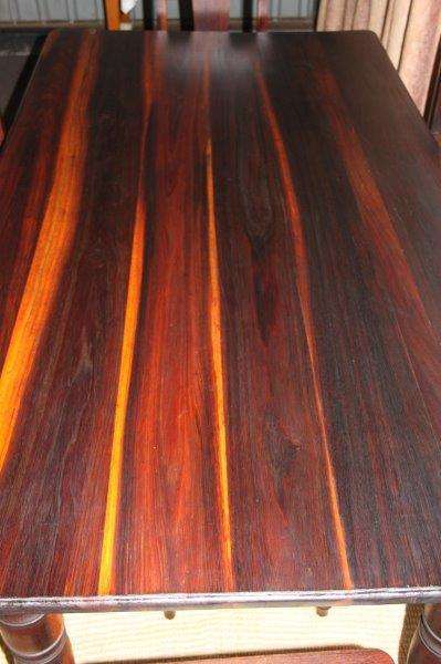 A SPECTACULAR SOLID STINKWOOD 6 TO 8-SEATER DINING TABLE WITH SOLID TURNED LEGS IN AWESOME CONDITION